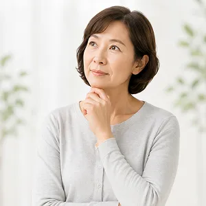 葬儀の費用について考える女性